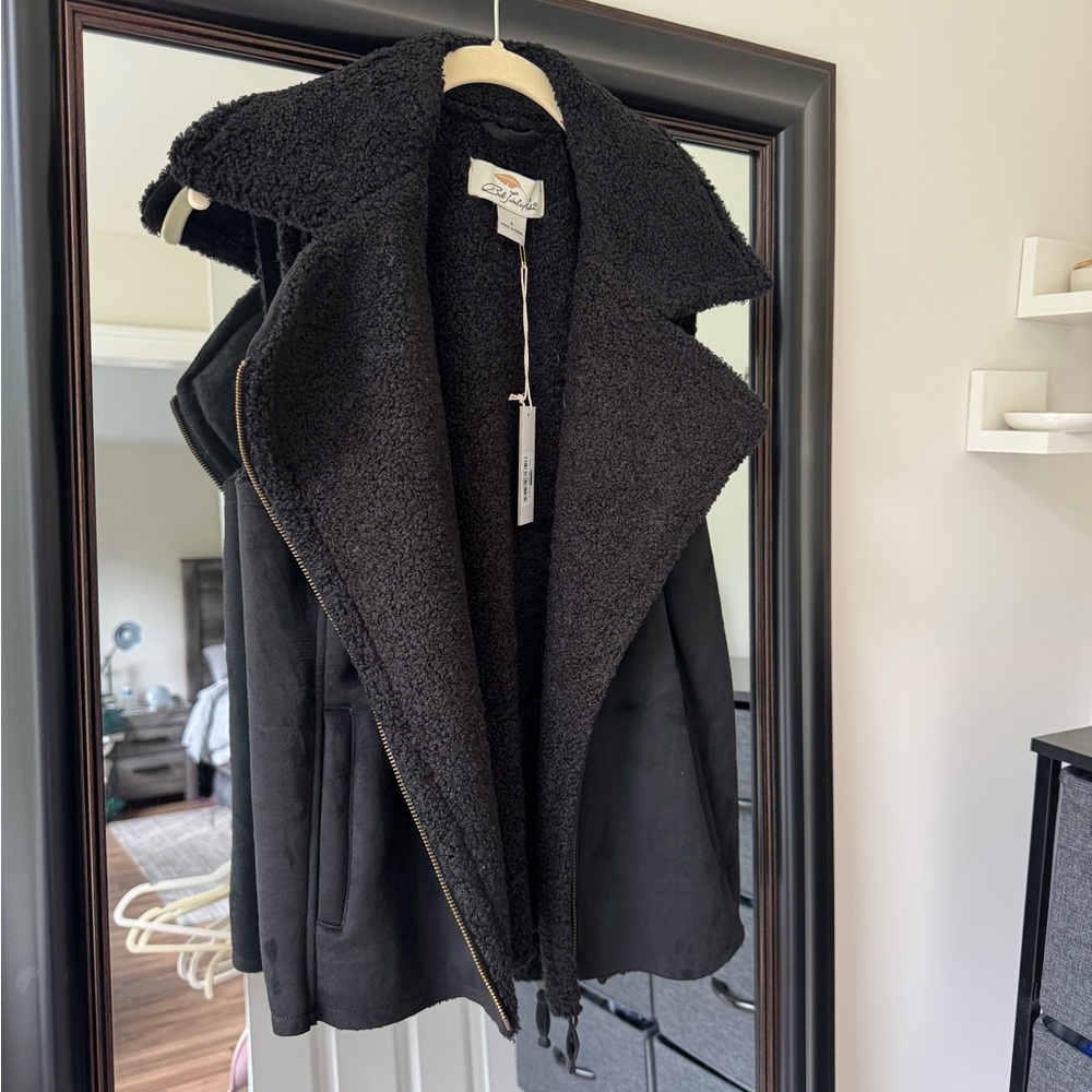Black Sherpa-lined moto vest